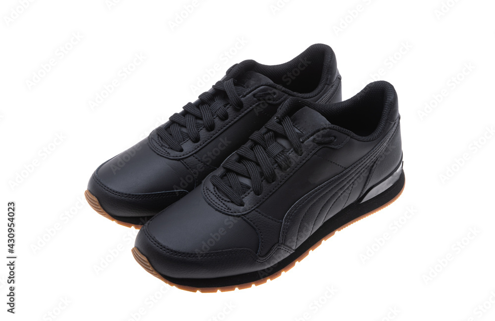 black leather sneakers isolated