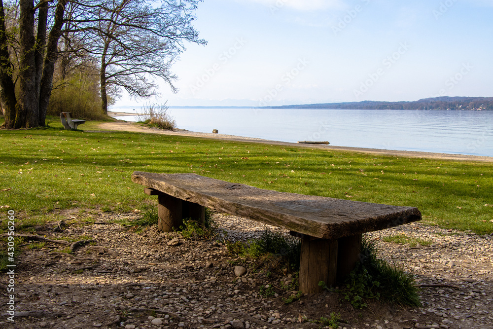 Bench on the beach with a wide view over the lake