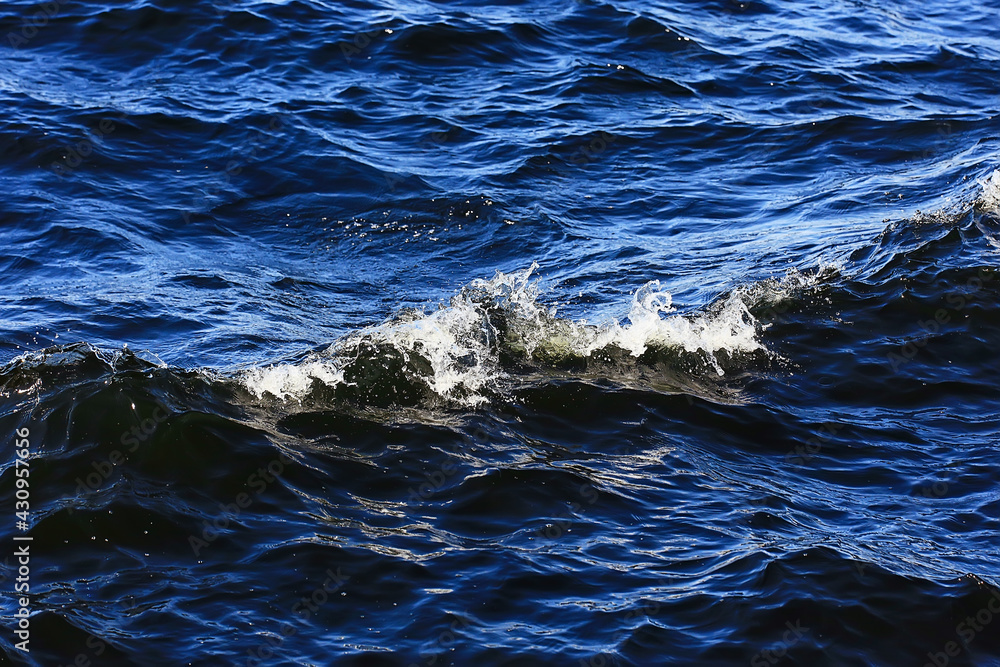 Fototapeta premium abstract background, texture sea blue water, waves and ripples on the ocean, sea pattern wallpaper