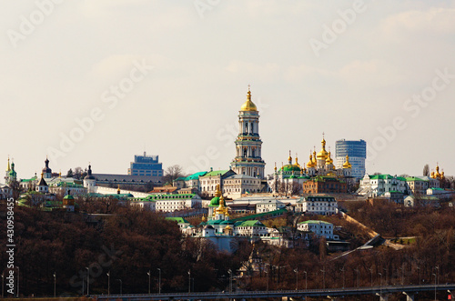Picturesque view of famous Kyiv s hills against sky. Scenic landscape of ancient Kyiv Pechersk Lavra. It is a historic Orthodox Christian monastery. Kyiv  Ukraine