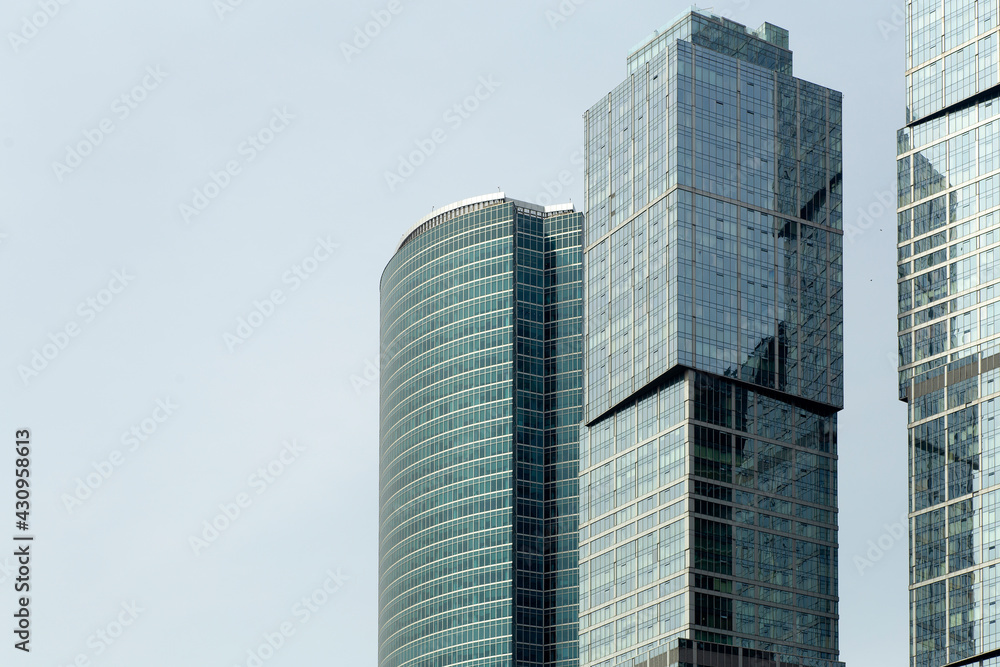 Business skyscrapers and modern office buildings of Moscow City against the sky with sunlight. Business and economics background Business skyscrapers and modern office buildings of Moscow City against the sky with sunlight. Business and economics background