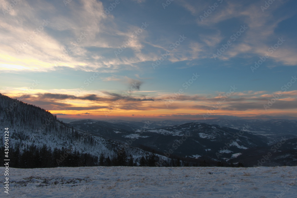 Sunset in the mountains. Winter in the mountains at sunset. Silesian Beskids.