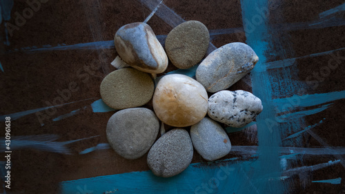 Abstract rocks in flower shape with blurred background low key