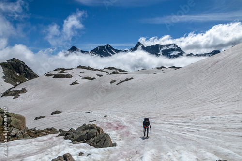 Randonnée aux lacs de la Belle Etoile en cours de dégel au printemps , Massif des Sept Laux , Chaîne de Belledonne , Isère , Alpes , France photo