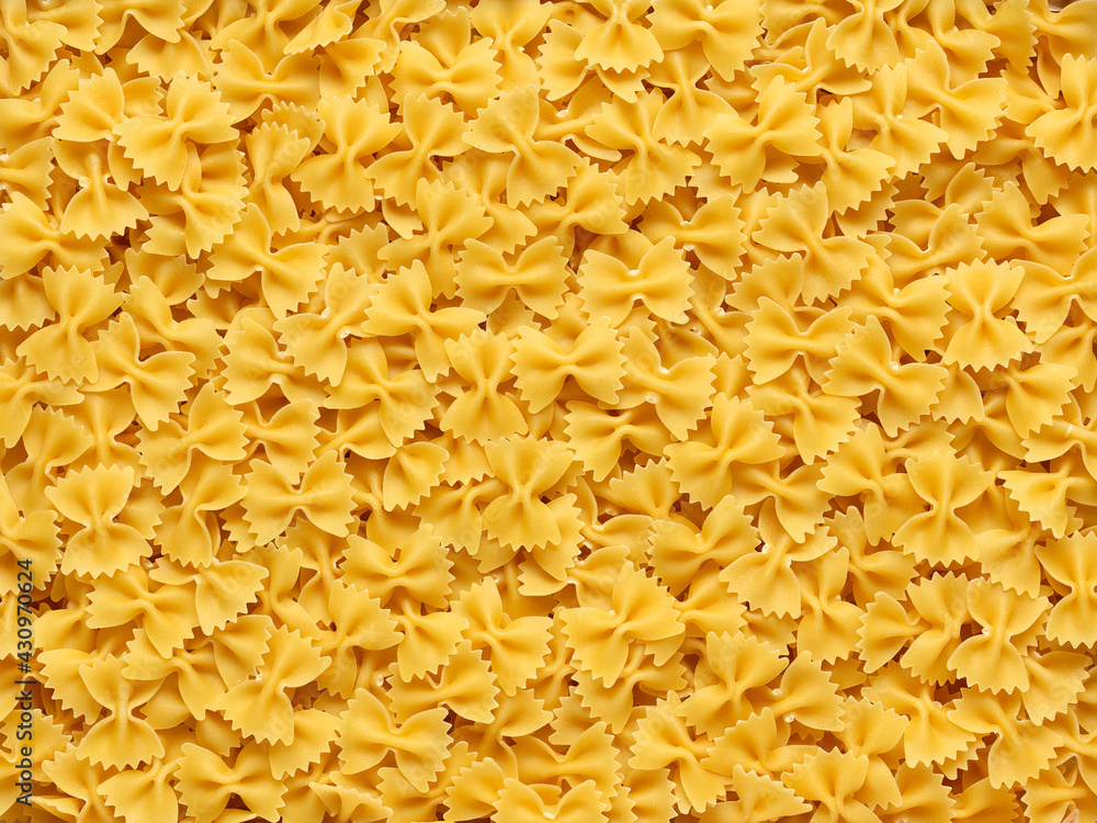 Macro image of many Italian pasta in the form of bows. Macro image of many Italian pasta in the form of bows.