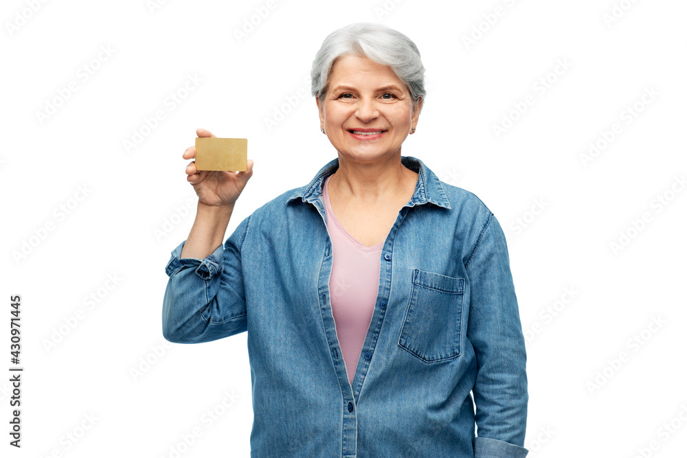 money, finance and old people concept - portrait of smiling senior woman with credit card over white background money, finance and old people concept - portrait of smiling senior woman with credit card over white background