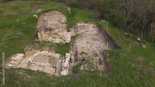 Drone aerial view on main gate ruin of Felix Timacum minus ancient castle and fortress military garrison from roman empire time with walls and buildings remaining located near Ravna Knjazevac Serbia photo