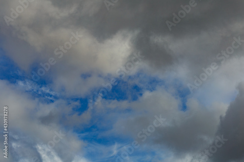 Wallpaper Mural Dark storm clouds on a bright blue sky. Sky patterns background 2021. Torontodigital.ca