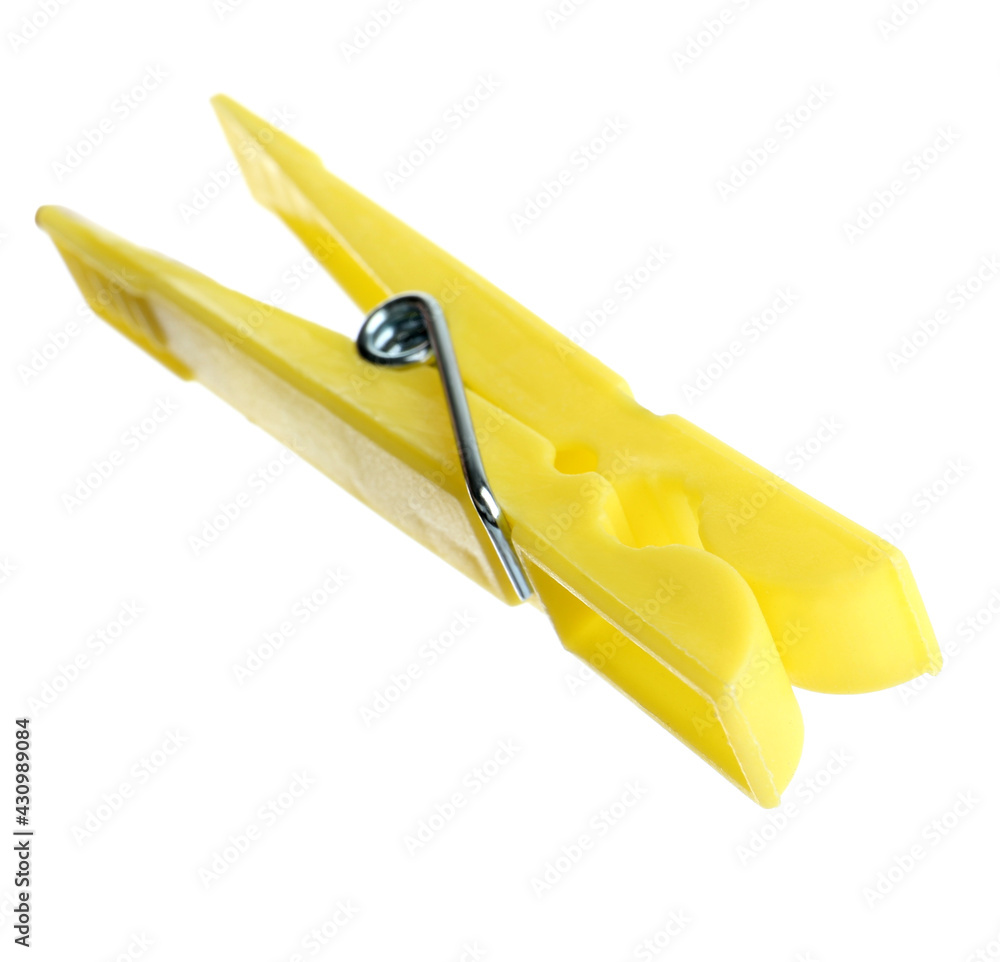 Bright yellow plastic clothespin isolated on white Bright yellow plastic clothespin isolated on white