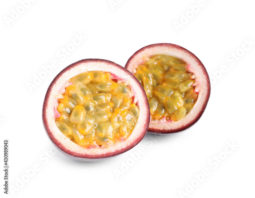 Cut ripe passion fruit isolated on white