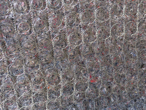Valokuva spiral springs with textile filling of an old mattress