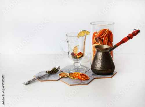 dried fruit in a jar and on the table. vegetarianism and healthy eating. energy for all time from healthy food. beautiful fruits in jars. weight loss. orange white glass. High quality photo