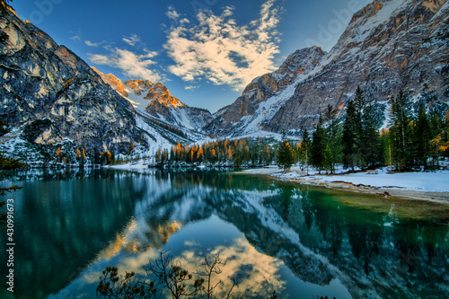 The beautiful Braies lake in late autumn with a little snow, Pearl of the Dolomite lakes is an UNESCO heritage and is located in the Braies Alto Adige,Italy