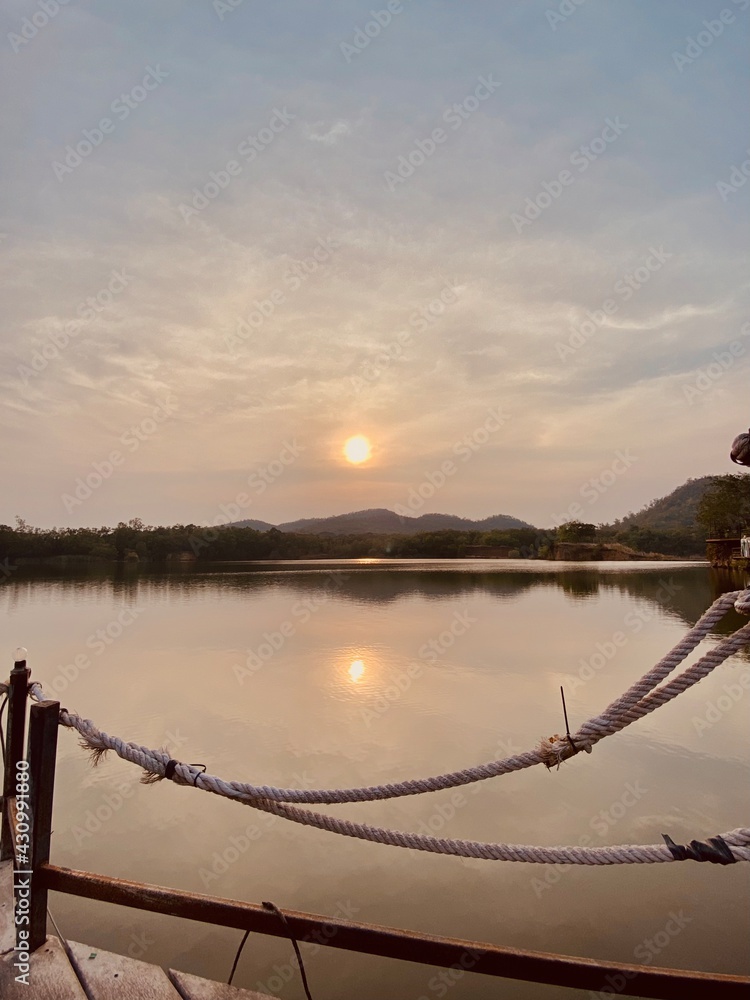 Fototapeta premium Lake view in the evening, sunset over mountain. Concept about relax and comfort.