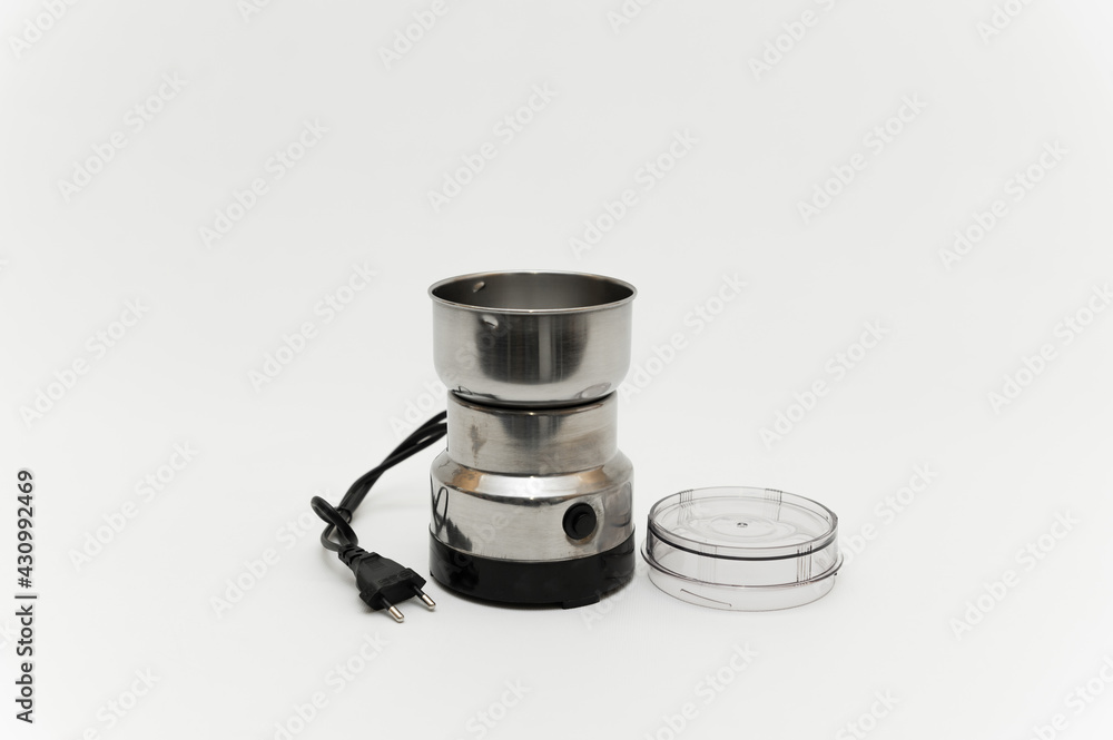 coffee grinder on a white background. coffee machine on a white background. electric coffee grinder. kitchen appliances. chinese goods for the kitchen