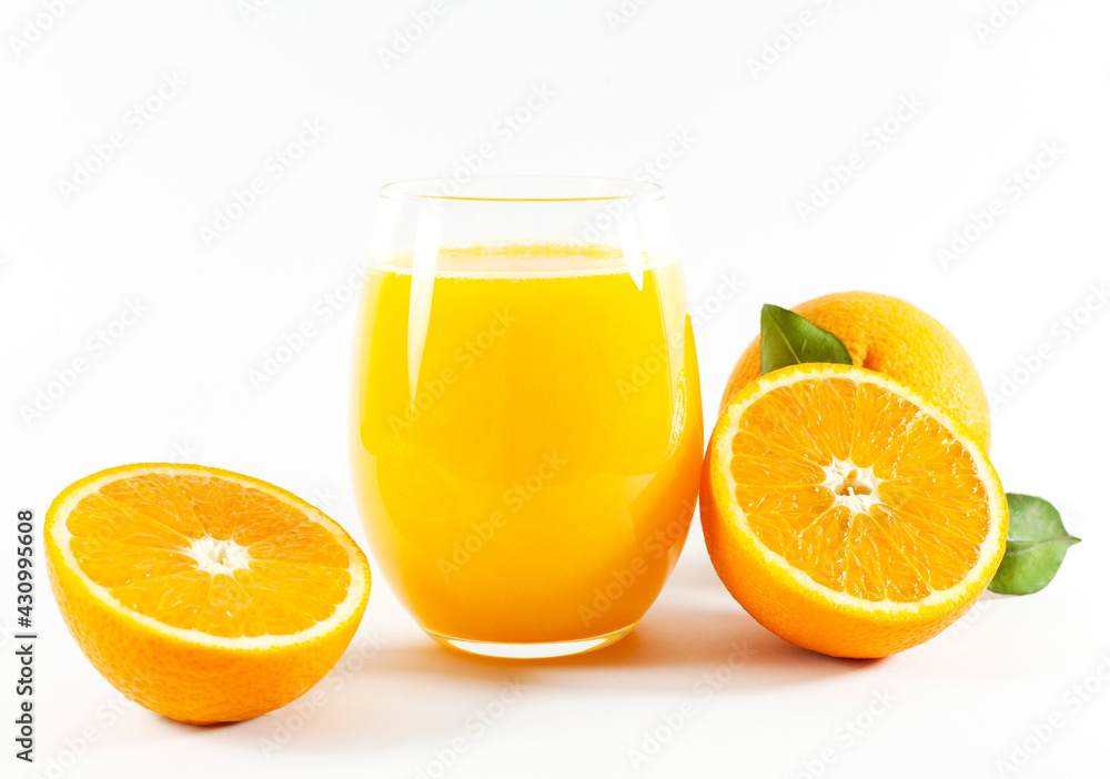 Glass of fresh orange juice with fruits cut in half and sliced with green leaf isolated on white background, clipping path Glass of fresh orange juice with fruits cut in half and sliced with green leaf isolated on white background, clipping path