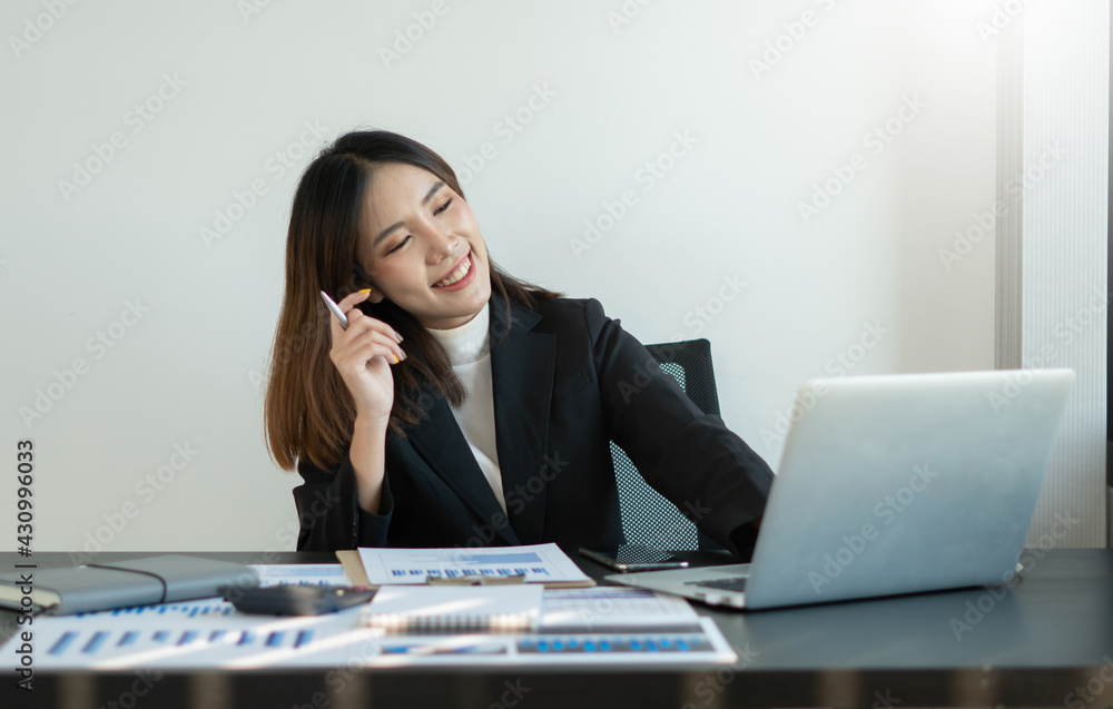 Portrait of business asian woman working in office use computer. Business owner people sme freelance online marketing ecommerce telemarketing, work from home concept Portrait of business asian woman working in office use computer. Business owner people sme freelance online marketing ecommerce telemarketing, work from home concept