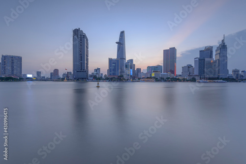 Place: Ho Chi Minh City, Vietnam. Time: April 30, 2021. When the sunset comes, the author noticed that the color of the sky has a huge change, the photo of the architecture shows that vividly.