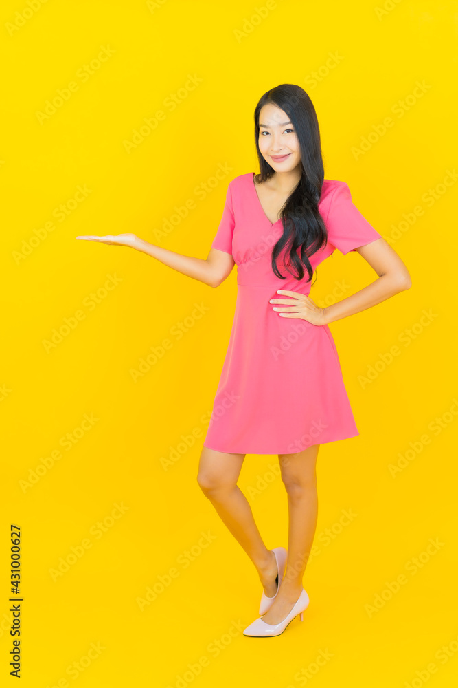 Portrait beautiful young asian woman smile with action Portrait beautiful young asian woman smile with action