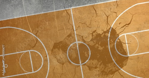 Composition of basketball court over cracked distressed surface