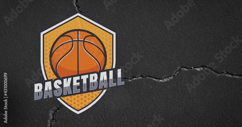 Composition of basketball text over orange sign and grey cracked distressed surface