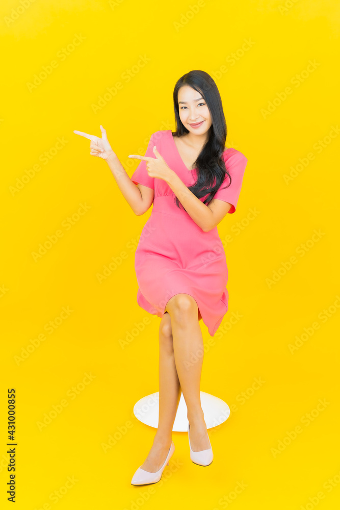 Portrait beautiful young asian woman smile with action Portrait beautiful young asian woman smile with action