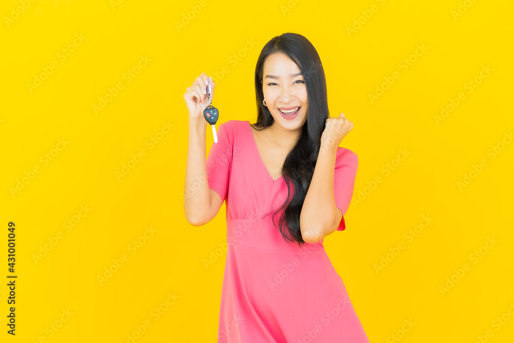 Portrait beautiful young asian woman smile with car key Portrait beautiful young asian woman smile with car key