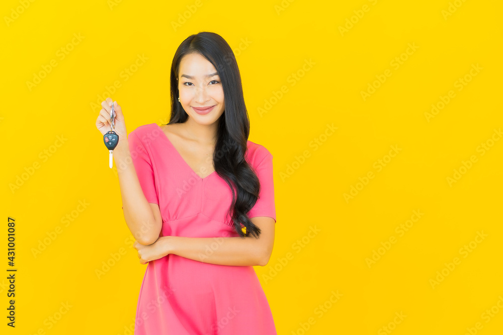 Portrait beautiful young asian woman smile with car key Portrait beautiful young asian woman smile with car key
