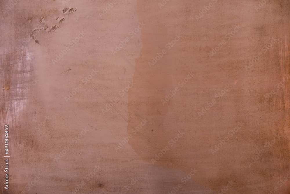 Partial wet copper background. Copy space. 