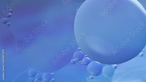 Blue cosmic planets move in space, macro bubbles