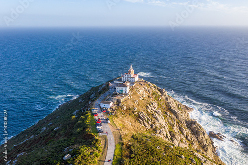 Aerial view of Faro de Fisterra, a lighthouse on the promontory facing the Atlantic Ocean, Fisterra, Galicia, Spain. photo