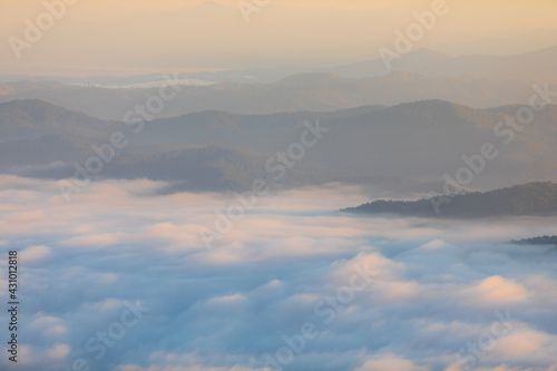 Sunrise time with sea of fog and clouds with mountain hill at Sri Nan National Park Doi Samer Dao Nan Province Thailand, Asia. © Phongsak