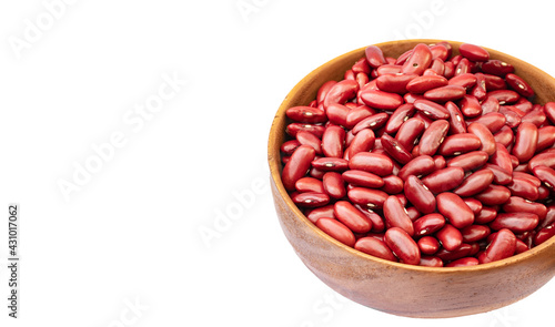 Kidney beans in wooden bowl on white background, copy space