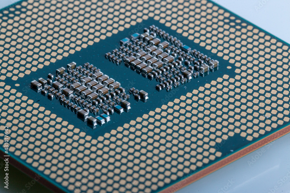 macro shot of the microchips of a modern processor macro shot of the microchips of a modern processor