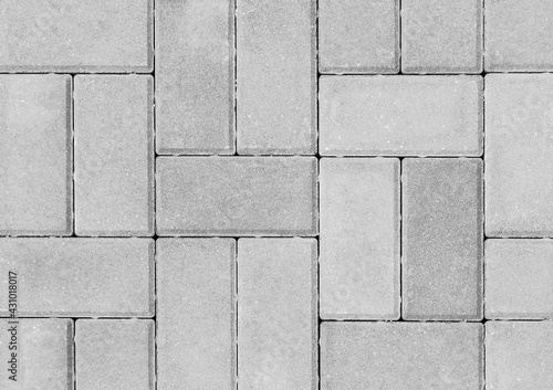 Gray paving slabs urban street road floor stone tile texture background, top view photo