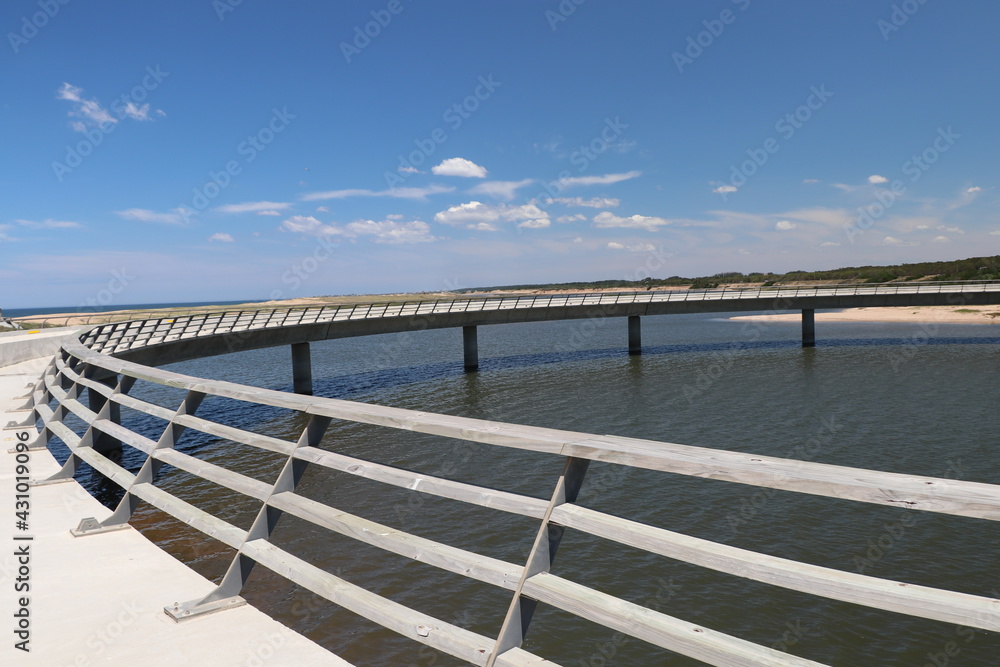 Circular bridge over the Garzon lagoon canal Circular bridge over the Garzon lagoon canal