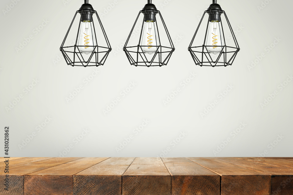 Wooden table of free space and three lamps. Wooden table of free space and three lamps.