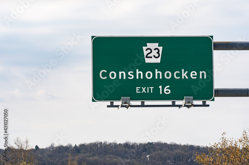Interstate highway 476 exit 16 sign for route 23 and Conshohocken Pennsylvania