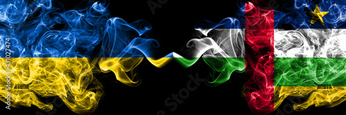 Ukraine  Ukrainian vs Central African Republic smoky mystic flags placed side by side. Thick colored silky abstract smokes flags.