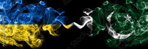 Ukraine  Ukrainian vs Pakistan  Pakistani smoky mystic flags placed side by side. Thick colored silky abstract smokes flags.