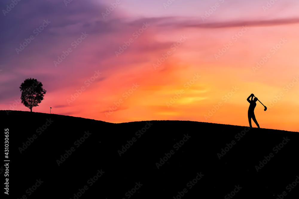 silhouette golfer hitting golf shot on sunset, in the summer for relax time