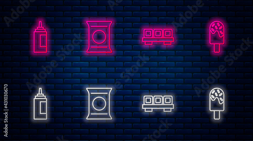 Set line Bag or packet potato chips, Sushi on cutting board, Sauce bottle and Ice cream. Glowing neon icon on brick wall. Vector