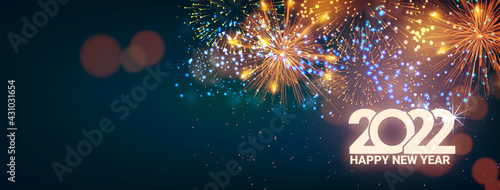 Greeting card Happy New Year 2022. Beautiful holiday web banner or billboard with text Happy New Year 2022 on the background of fireworks.
