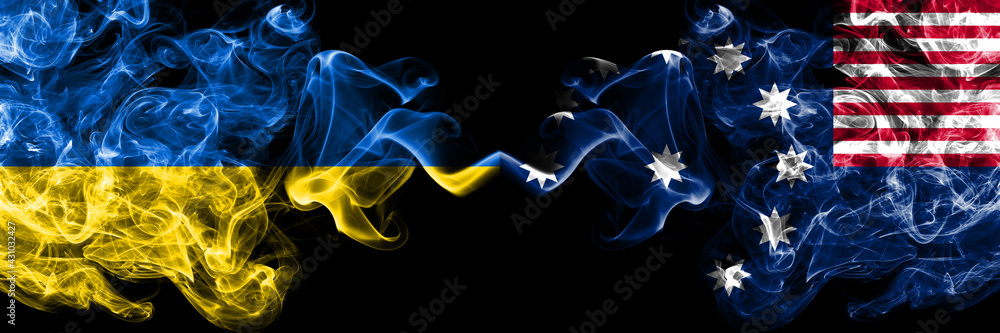 Fototapeta premium Ukraine, Ukrainian vs United States of America, America, US, USA, American, Easton, Pennsylvania smoky mystic flags placed side by side. Thick colored silky abstract smokes flags.