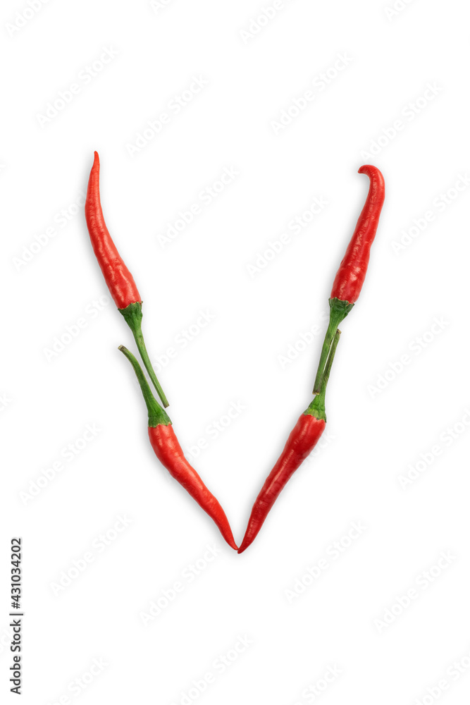 Font made of hot red chili pepper isolated on white - letter V Font made of hot red chili pepper isolated on white - letter V