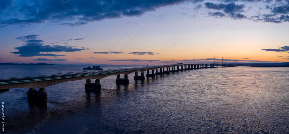 Obraz premium Severn Bridge crossing from England to Wales, at sunset. The bridge is also called the Prince of Wales Bridge