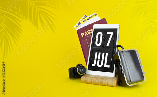 July 7th. Day 7 of month, Calendar date. Mechanical calendar display on your smartphone. The concept of travel. Summer month, day of the year concept.