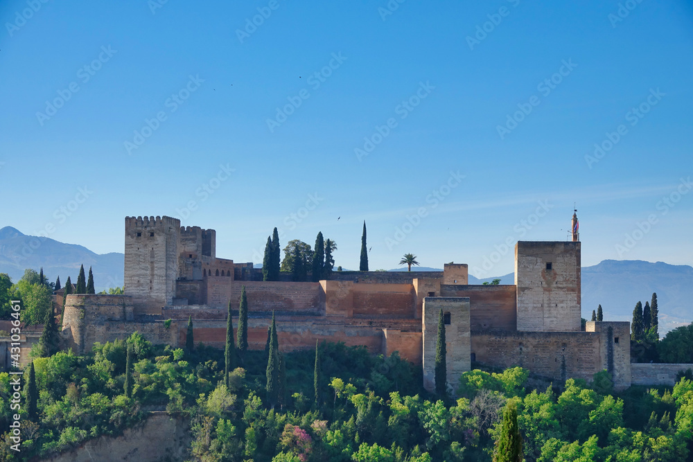 View of the Torre de la Vela in the Alhambra in Granada (Spain) at sunrise, one of the most visited World Heritage monuments