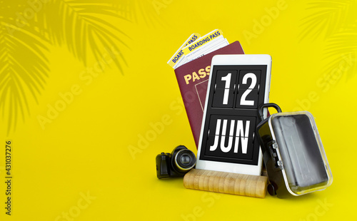 June 12nd. Day 12 of month, Calendar date. Mechanical calendar display on your smartphone. The concept of travel. Summer month, day of the year concept. photo