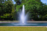 fountain in the park; long exposure creates a silky effect of spouting water.